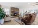 Inviting living room featuring a stone fireplace, and an open concept design at 503 Brookfield Cir # 1, Salisbury, NC 28146