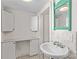 Bathroom vanity features a marble countertop and ample cabinet space at 506 S Church St, Salisbury, NC 28144