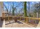 Enjoy outdoor living on this spacious wooden deck with a barrel table at 506 S Church St, Salisbury, NC 28144