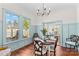 Charming dining room with hardwood floors, chandelier, and a vintage dining set at 506 S Church St, Salisbury, NC 28144