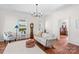 Bright living room featuring a fireplace, hardwood floors, neutral color palette, and lots of natural light at 506 S Church St, Salisbury, NC 28144