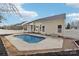 Backyard featuring swimming pool and a view of the home's exterior with white trim and siding at 529 Veloce Trl, Fort Mill, SC 29715