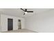 Bedroom featuring a ceiling fan and a door leading to the bathroom at 529 Veloce Trl, Fort Mill, SC 29715