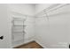 Walk-in closet with wire shelving for ample storage at 529 Veloce Trl, Fort Mill, SC 29715