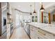 Modern kitchen with white cabinets and marble countertops at 5645 White Store Rd, Wingate, NC 28174