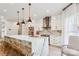 Large kitchen island with seating and marble countertop at 5645 White Store Rd, Wingate, NC 28174