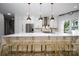 Modern kitchen with white cabinets and marble countertops at 5645 White Store Rd, Wingate, NC 28174