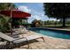 Relax by the inviting pool, complete with lounge chairs and a charming gazebo, perfect for outdoor leisure at 5645 White Store Rd, Wingate, NC 28174