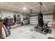 Spacious garage with storage, gym equipment, and bike storage at 5826 Castlecove Rd, Charlotte, NC 28273