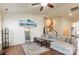 Open living room with vaulted ceilings, hardwood floors, and staircase to second floor, great flow and space at 5826 Castlecove Rd, Charlotte, NC 28273