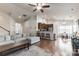 Open floor plan connects the living room to the kitchen for easy entertaining, promoting a social ambiance at 5826 Castlecove Rd, Charlotte, NC 28273