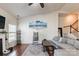 Bright and airy living room with vaulted ceilings, natural light, and hardwood floors, perfect for relaxing at 5826 Castlecove Rd, Charlotte, NC 28273