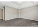 Simple bedroom with carpet and neutral walls at 5851 Brookfield Pointe Dr, Charlotte, NC 28216