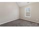 Bright bedroom with carpet and window at 5851 Brookfield Pointe Dr, Charlotte, NC 28216