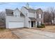 Two-story house with attached garage and stone accents at 5851 Brookfield Pointe Dr, Charlotte, NC 28216