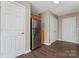 View of kitchen with stainless steel refrigerator and pantry at 5851 Brookfield Pointe Dr, Charlotte, NC 28216