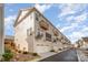 Exterior view showcasing townhouse-style homes with balconies and attached garages at 604 Amalfi Dr, Davidson, NC 28036