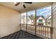 Relaxing screened porch showing outdoor living space and neighborhood views at 604 Amalfi Dr, Davidson, NC 28036