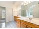 Bathroom boasts double sinks, wood cabinets, and a large shower at 606 Elmhurst Dr, Fort Mill, SC 29715