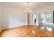 Formal dining room with hardwood floors and chandelier at 606 Elmhurst Dr, Fort Mill, SC 29715