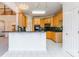 Kitchen with granite countertops and light wood cabinets at 606 Elmhurst Dr, Fort Mill, SC 29715