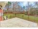 Concrete patio with a metal railing and steps leading to the yard at 606 Elmhurst Dr, Fort Mill, SC 29715