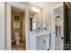 Bathroom with toilet, vanity, and shower/tub combo at 6911 Fauna Dr # 60, Charlotte, NC 28215