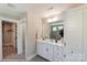 Bathroom with white vanity, hexagon tile floor, and walk-in shower at 6911 Fauna Dr # 60, Charlotte, NC 28215