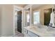 Small bathroom with white vanity and closet at 6911 Fauna Dr # 60, Charlotte, NC 28215