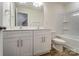 Bright bathroom with double vanity and a shower-tub combo at 6911 Fauna Dr # 60, Charlotte, NC 28215