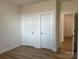 Spacious bedroom with two closets and hardwood floors at 6911 Fauna Dr # 60, Charlotte, NC 28215