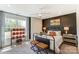 Spacious bedroom with a basketball theme and large window at 6911 Fauna Dr # 60, Charlotte, NC 28215