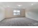 Spacious carpeted bedroom with recessed lighting, perfect for relaxation or productivity at 6911 Fauna Dr # 60, Charlotte, NC 28215