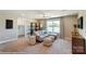 Bonus room with L-shaped sofa and built-ins at 6911 Fauna Dr # 60, Charlotte, NC 28215