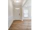 Welcoming entryway with classic trim work and durable wood-look flooring at 6911 Fauna Dr # 60, Charlotte, NC 28215