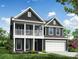 Two-story house with gray siding, white trim, and a two-car garage at 6911 Fauna Dr # 60, Charlotte, NC 28215