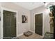 Bright foyer featuring neutral colors and two doors at 6911 Fauna Dr # 60, Charlotte, NC 28215