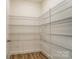 The pantry features wire shelving to keep your non-perishable food organized at 6911 Fauna Dr # 60, Charlotte, NC 28215