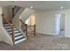 Upstairs hall with carpeted flooring and a staircase at 6911 Fauna Dr # 60, Charlotte, NC 28215