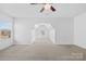 Bright bedroom featuring a dormer window and carpet flooring at 7405 Bosson Sw St, Concord, NC 28025