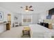 Bright and airy primary bedroom with a king-size bed and ensuite bathroom at 7405 Bosson Sw St, Concord, NC 28025