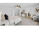 Main bedroom with king bed, window seating and en-suite bathroom at 7405 Bosson Sw St, Concord, NC 28025