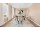 Bright dining room with chandelier and seating for six at 7405 Bosson Sw St, Concord, NC 28025