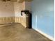 Unfinished garage with water heater and sink at 7405 Bosson Sw St, Concord, NC 28025