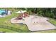 playground with swings and slides at 7405 Bosson Sw St, Concord, NC 28025