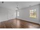 Spacious bedroom with hardwood floors and large windows at 835 Museum Dr, Charlotte, NC 28207