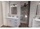 Bright bathroom boasts modern fixtures, shiplap walls, and views of the Primary bedroom at 000 Ridgecrest Rd # 10, Locust, NC 28097