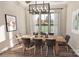 This spacious dining room features hardwood floors and has large windows that fill the room with natural light at 000 Ridgecrest Rd # 10, Locust, NC 28097
