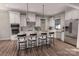 Modern kitchen with stainless steel appliances, granite countertops, pendant lighting, and an island with seating at 000 Ridgecrest Rd # 10, Locust, NC 28097