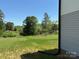 Spacious backyard with lush green grass, perfect for recreation and relaxation at 106 Gilliatt St, Shelby, NC 28150